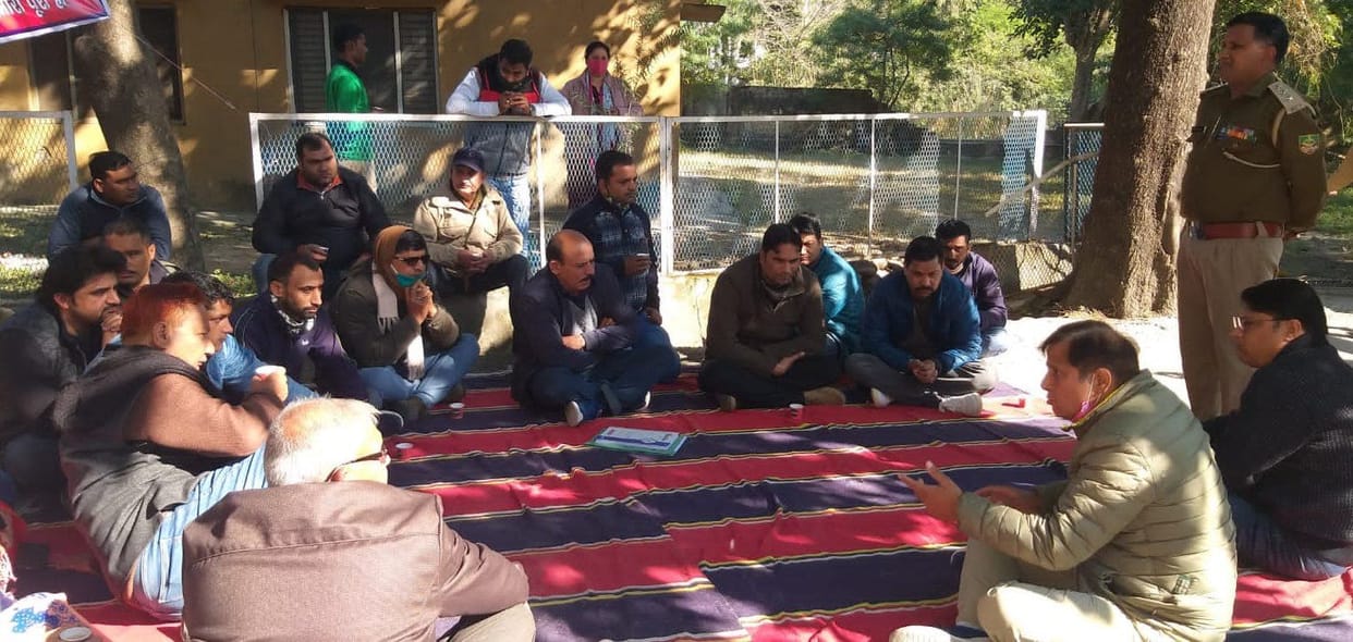 Forest department employees are standing on dharna