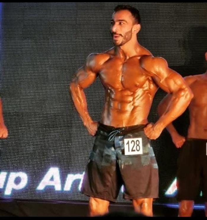 The name of the city shone as Mr. World in body building