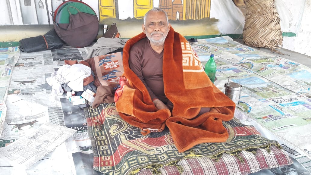 Retired employee sitting on indefinite strike