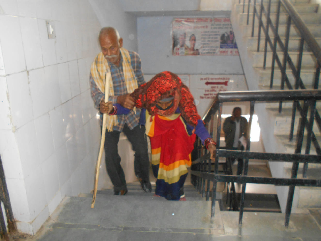 Patients breathing out on the stairs of the hospital