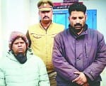 शिक्षिका को पीटने के आरोपी दंपति।