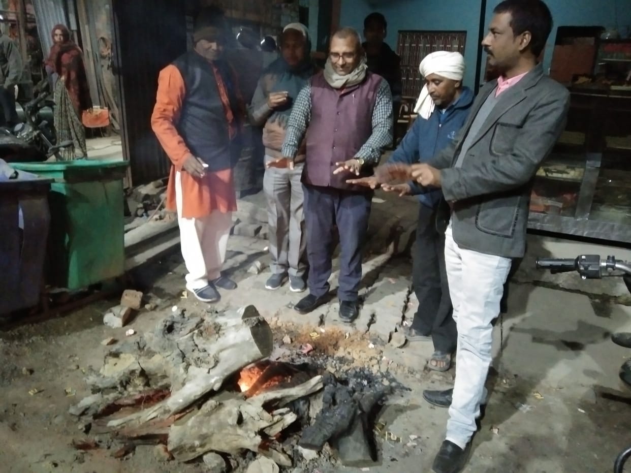 Cold wave increased cold, bonfire burnt somewhere, wood did not reach anywhere