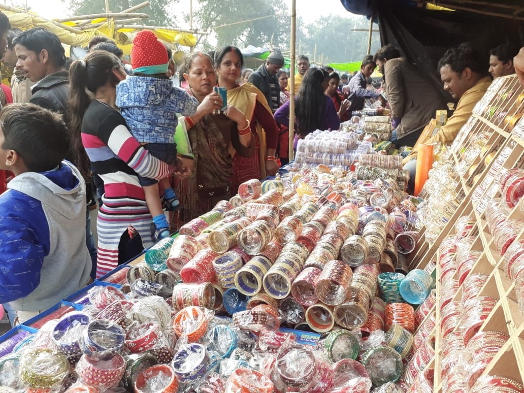 Children swing and elders enjoy chaat