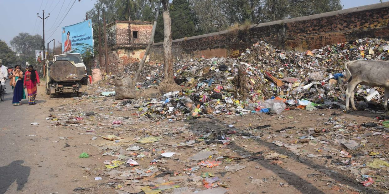 Garbage is ringing in the dumpster, not being picked up