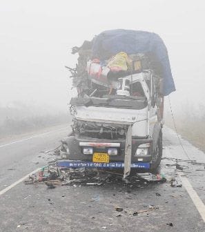 Helper killed in truck collision, three injured including two drivers
