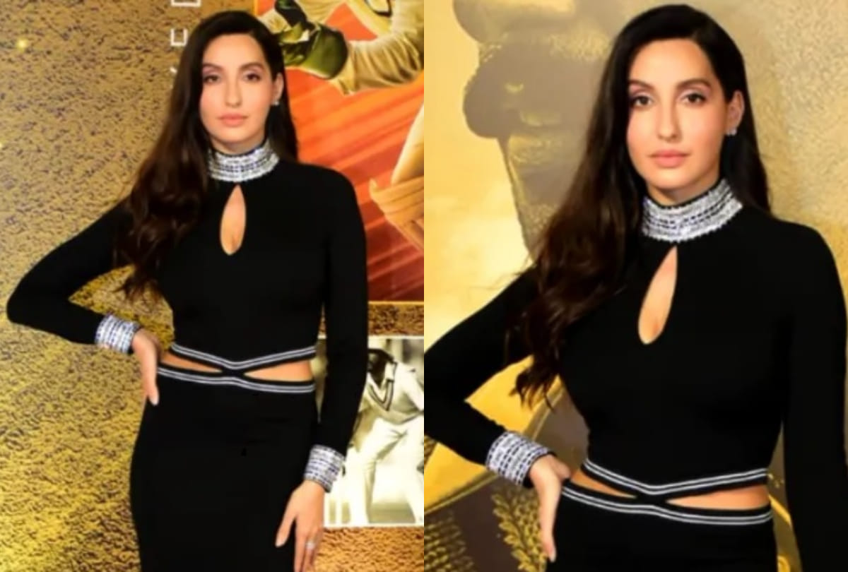 nora fatehi flaunts curvy figure in silver midi dress