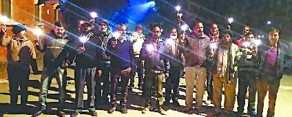 Employees demonstrated by taking out candle march