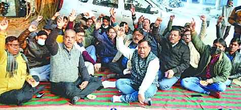 Under Engineer of Electricity Corporation sitting on dharna outside the Chief Office