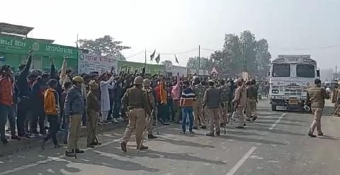 Police car surrounded in protest against comment on social media
