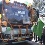 वोल्वो बस सेवा का शुभारंभ करते परिवहन मंत्री बिक्रम सिंह।