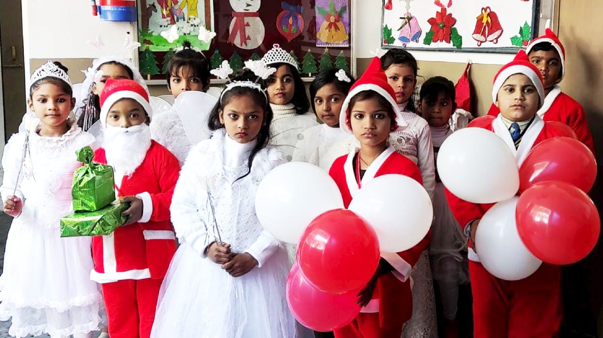 Children dressed as Santa Claus and Angel, celebrated Christmas