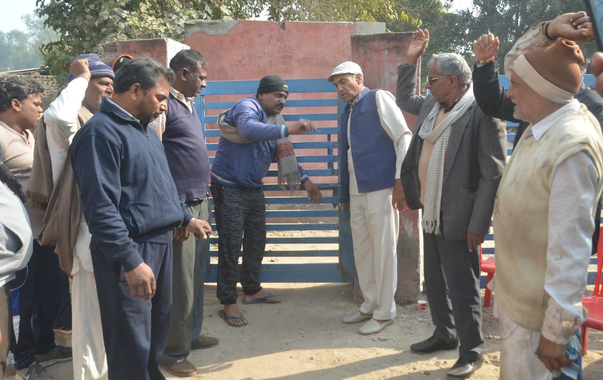 Distressed by the stalled sewer system, the shopkeepers locked the pumping station, staged a sit-in on the road