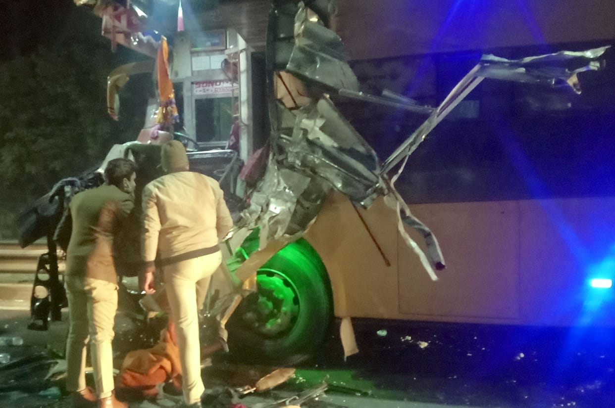 Four men and one woman died in a collision between two buses