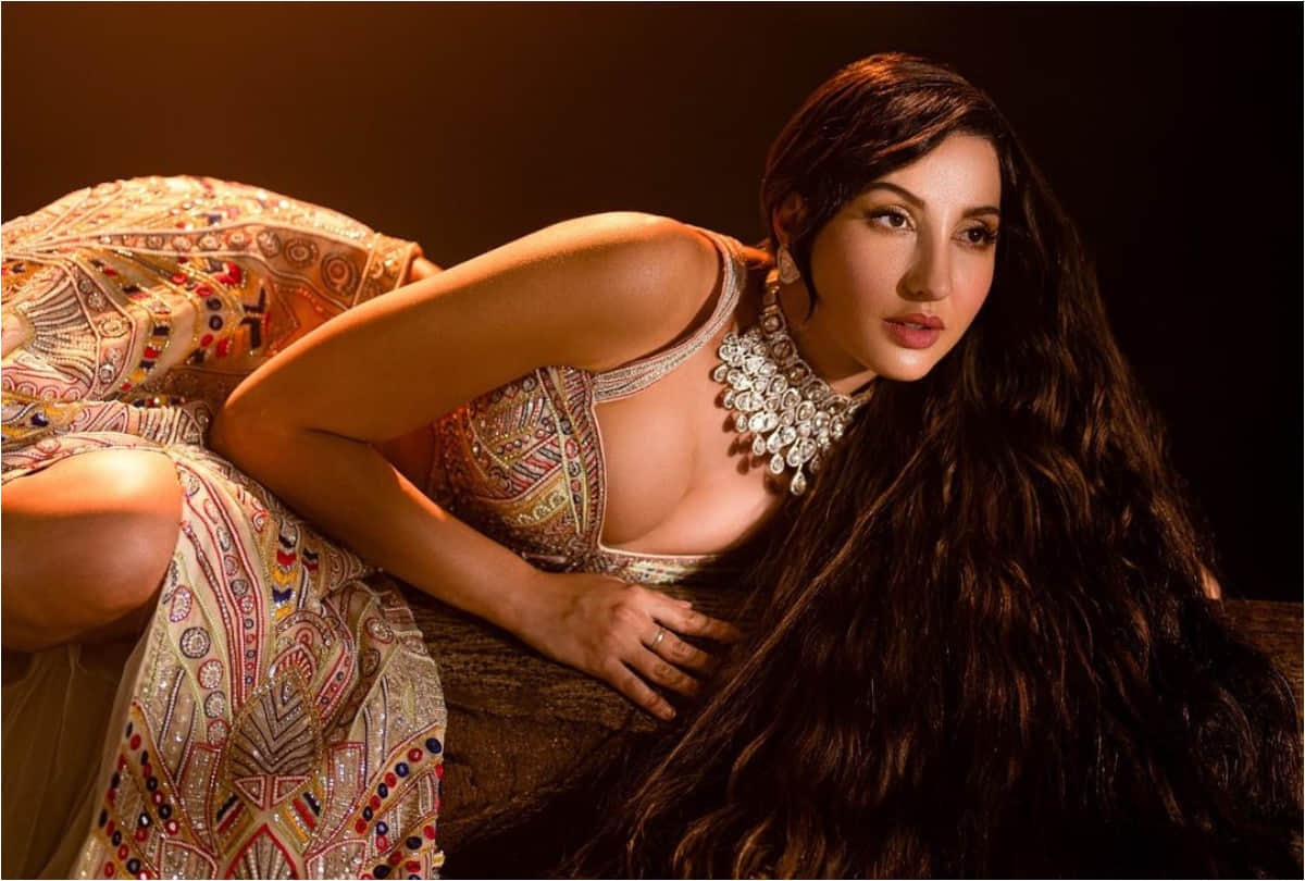 nora fatehi bold look with thigh high slit lehenga in latest photoshoot