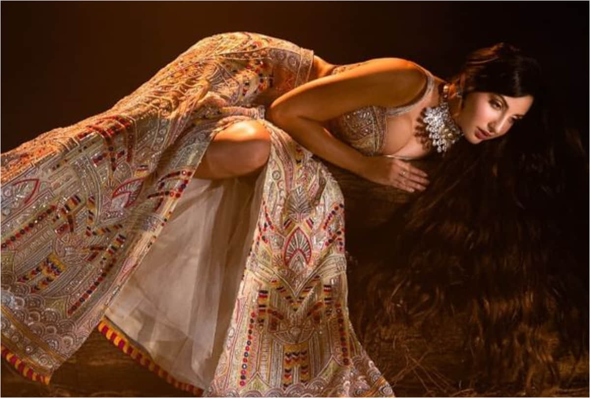 nora fatehi bold look with thigh high slit lehenga in latest photoshoot