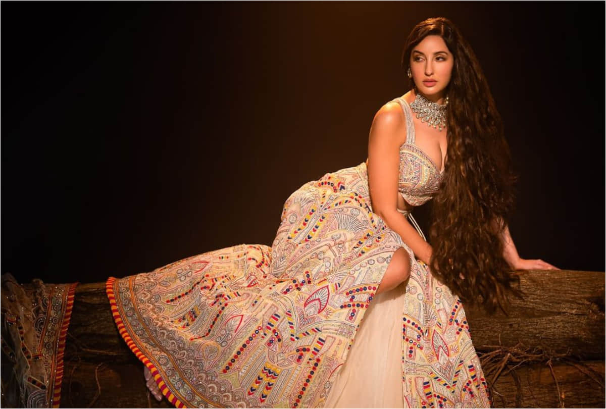 nora fatehi bold look with thigh high slit lehenga in latest photoshoot