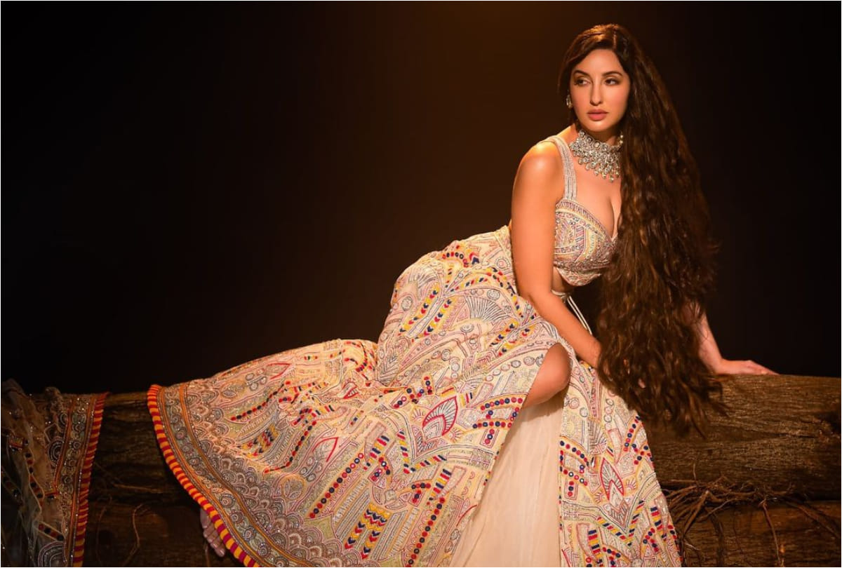 nora fatehi bold look with thigh high slit lehenga in latest photoshoot