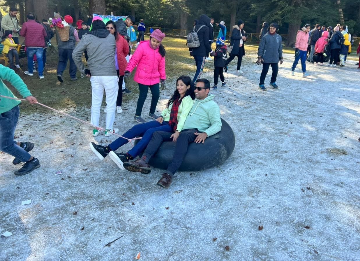 Tourists enjoying ice skating in Khajjiar