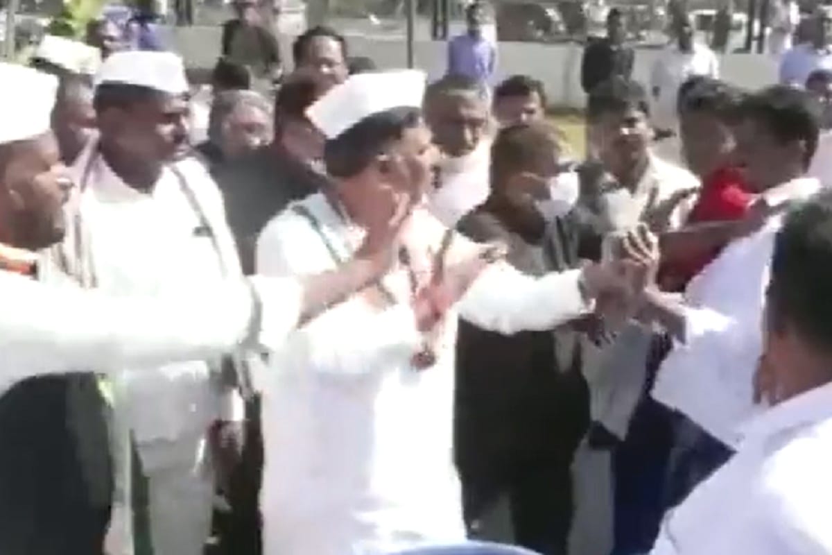 Karnataka Congress chief DK Shivakumar scolds a man trying to take selfie with him in Mandya