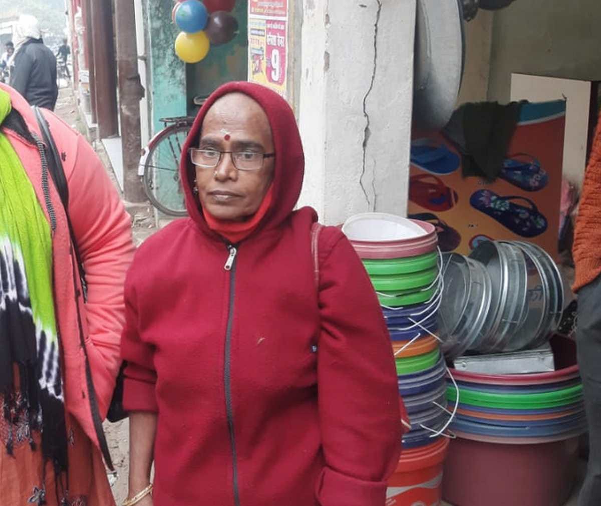 Telangana Old woman strayed from airport meet with help of Social media in varanasi