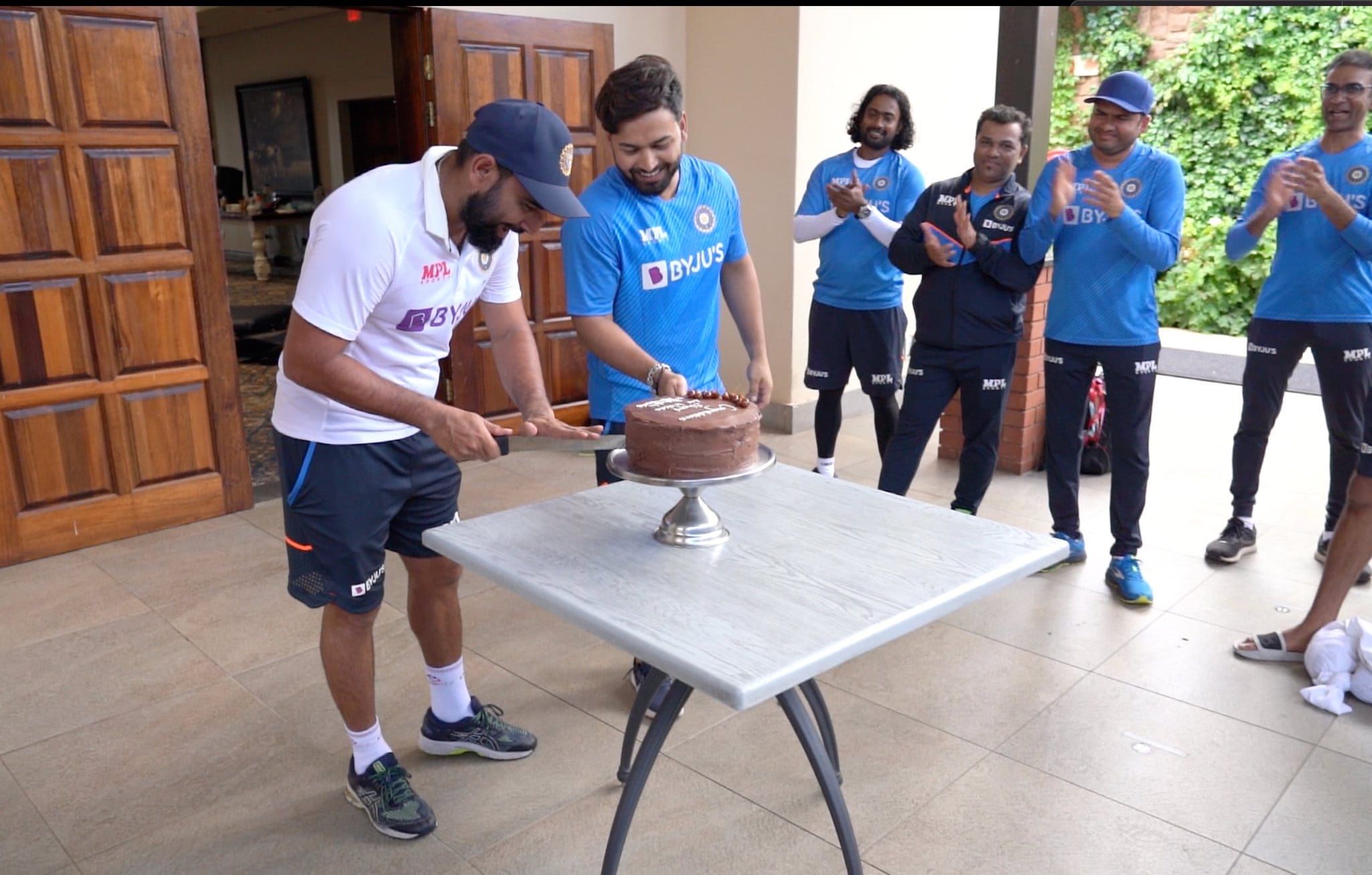 PHOTOS of IND vs SA 1st Test Photos: Rishabh Pant, Mohammad Shami cut cake, Virat Kohli Cheteshwar Pujara's dance during Centurion Test; Mohammad Siraj Ronaldo's style celebration