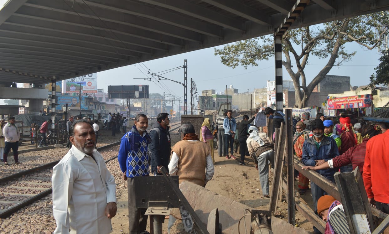 Hathras: The train is less visible than the curved turn at the pond crossing