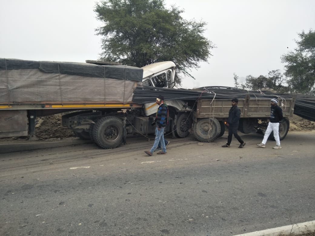 Road accident in mau Truck collided with tractor trolley on middle of road both vehicles damaged