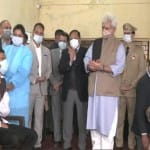 कोरोना टीकाकरण का शुभारंभ करवाते एलजी मनोज सिन्हा।