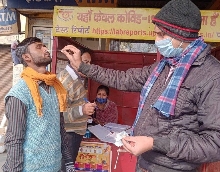 corona test sampling on bus station , railway station