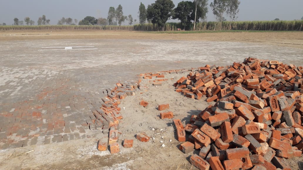 The workers rushed to uproot the bricks of the helipad