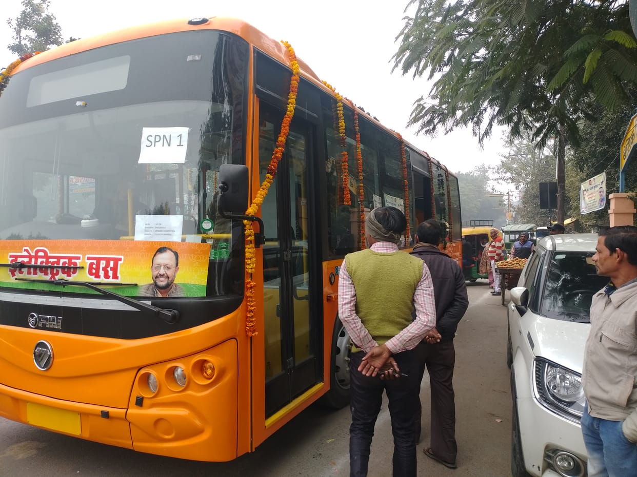 Electric buses ran in the city, people traveled