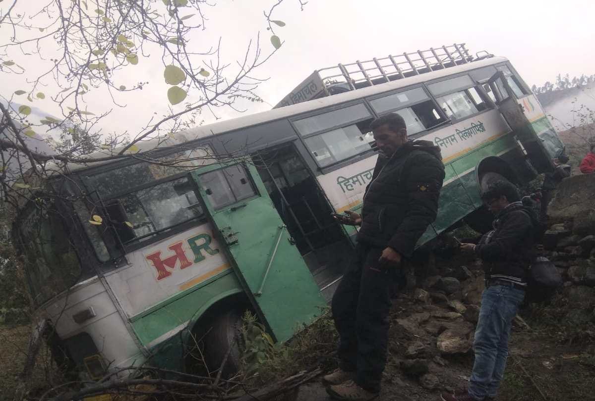 uncontrolled Bus rolled down from the road, half of it hanging in the air,27   passengers narrowly escaped