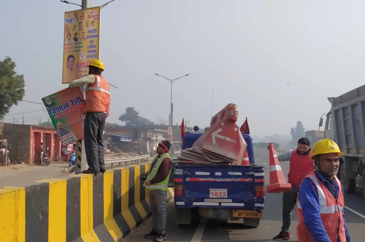 By campaigning, the highway administration got the banner-poster down