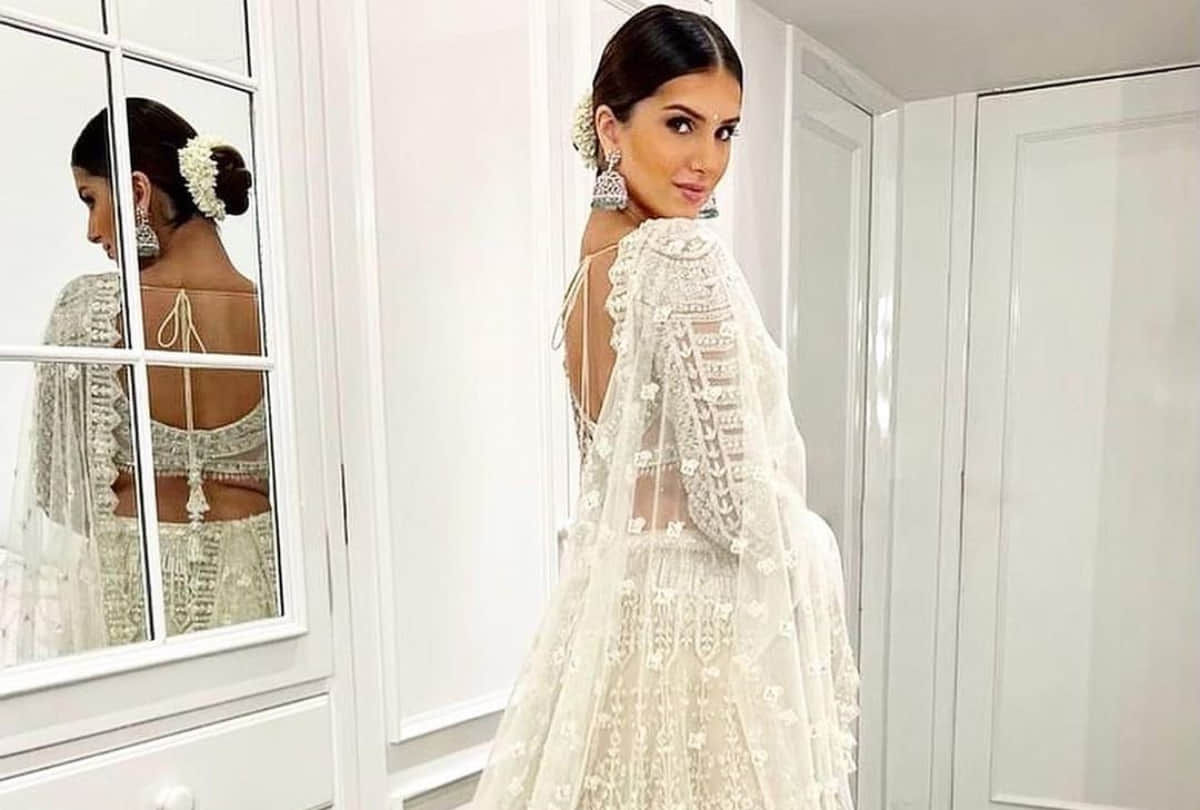 tara sutaria show elegance and royalty in silver white lehenga from falguni shane peacock