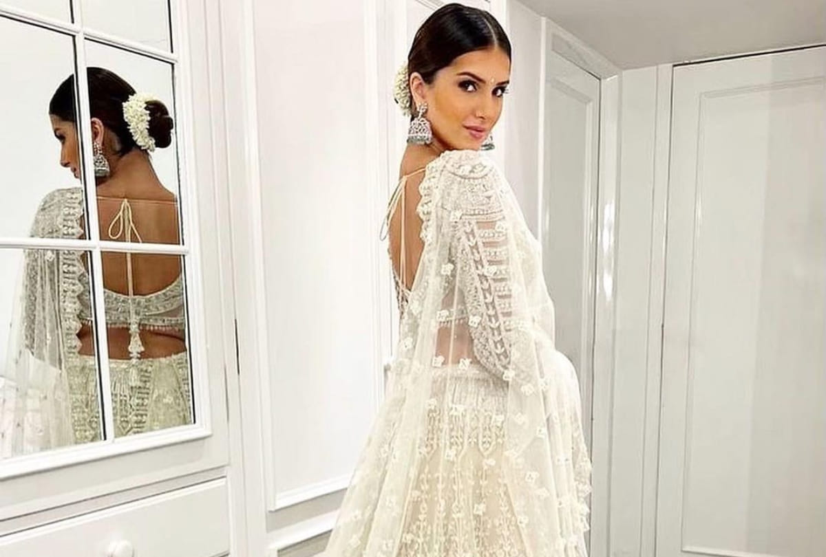 tara sutaria show elegance and royalty in silver white lehenga from falguni shane peacock