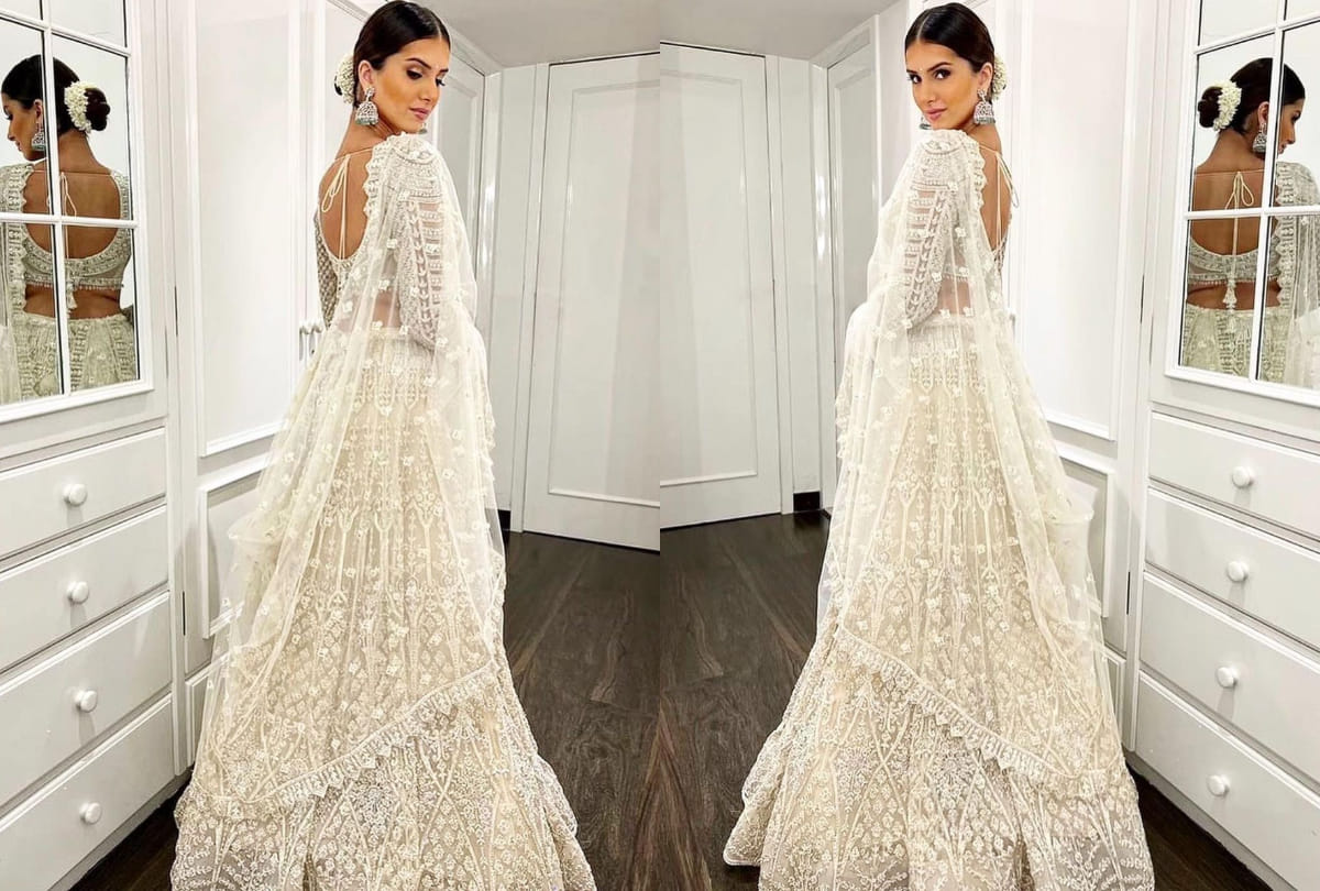 tara sutaria show elegance and royalty in silver white lehenga from falguni shane peacock