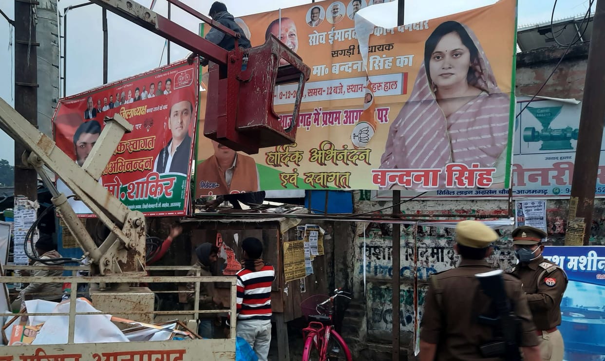 Poster-banners removed, flags removed from vehicles
