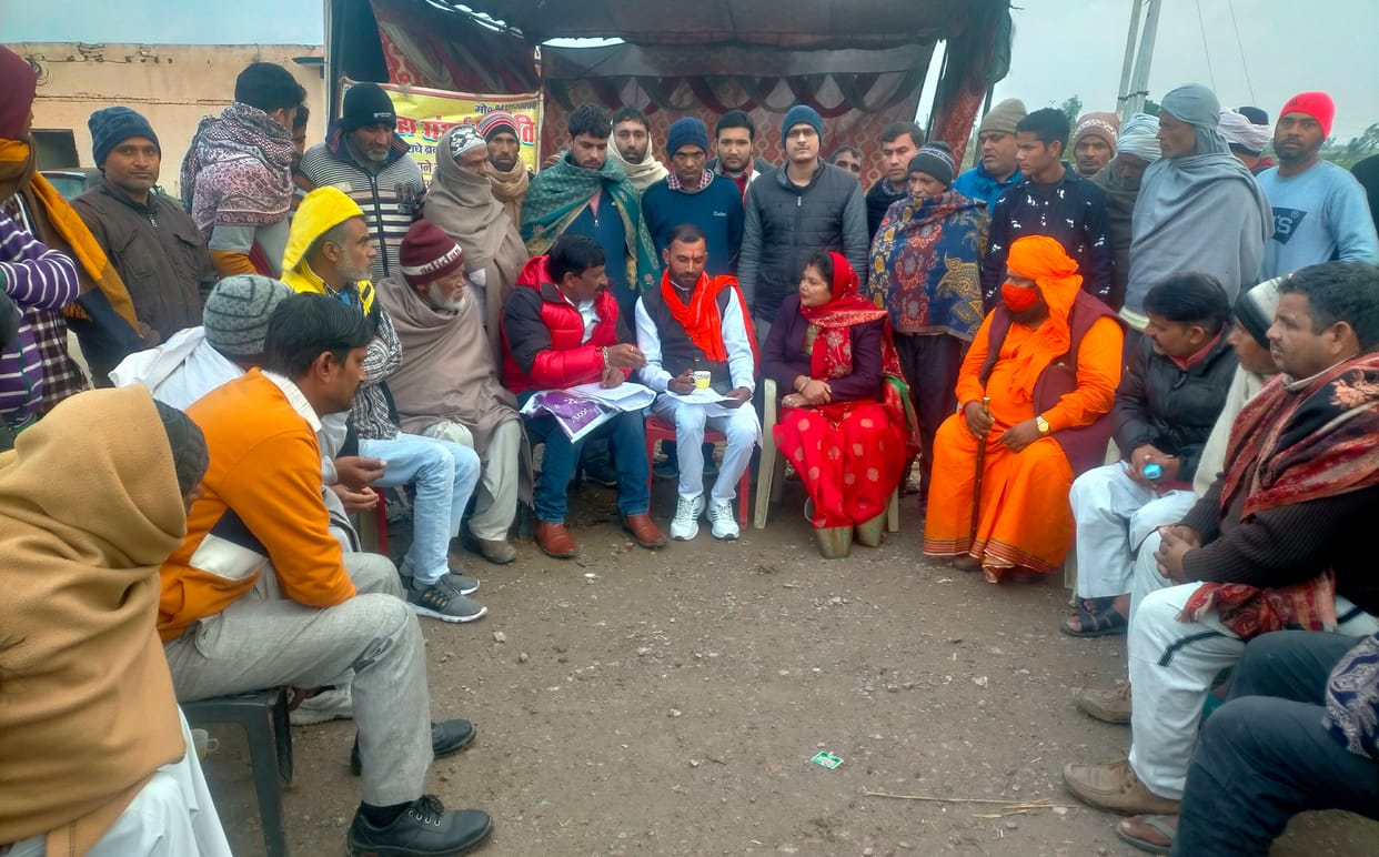 Farmers standing on dharna even in rain