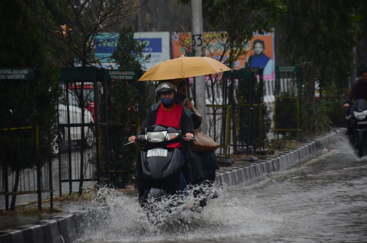 Roads submerged due to rain, mountains laden with snow