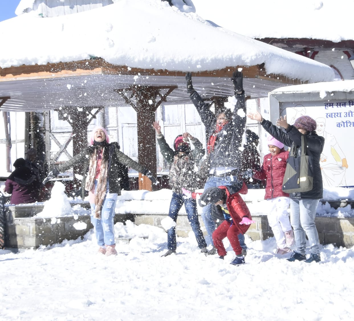 The weather is open, tourists have fun in the snow