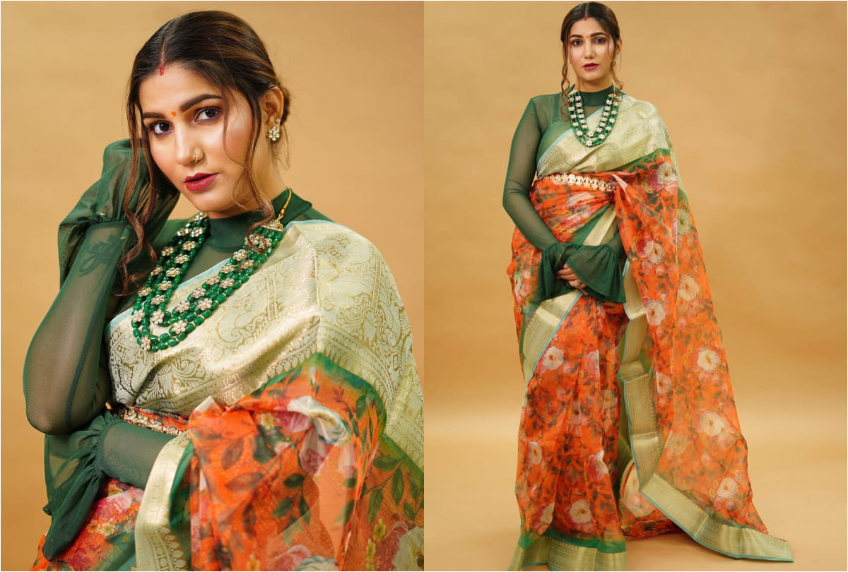 sapna choudhary green orange saree look stunning