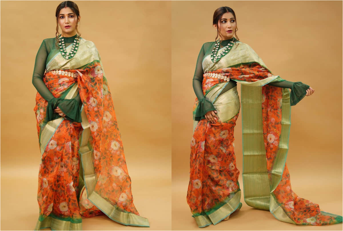 sapna choudhary green orange saree look stunning