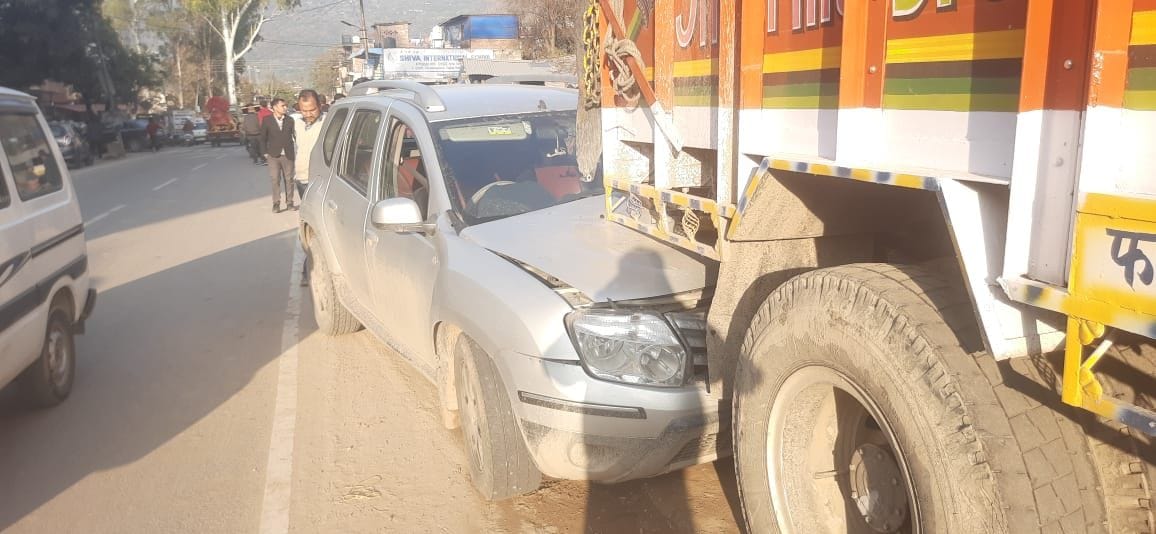 car stuck in truck