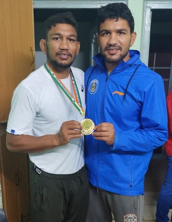 Wrestling preparation while in navy, won gold in national ranking