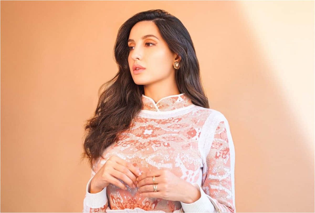 nora fatehi bling in gold pant suit latest photoshoot
