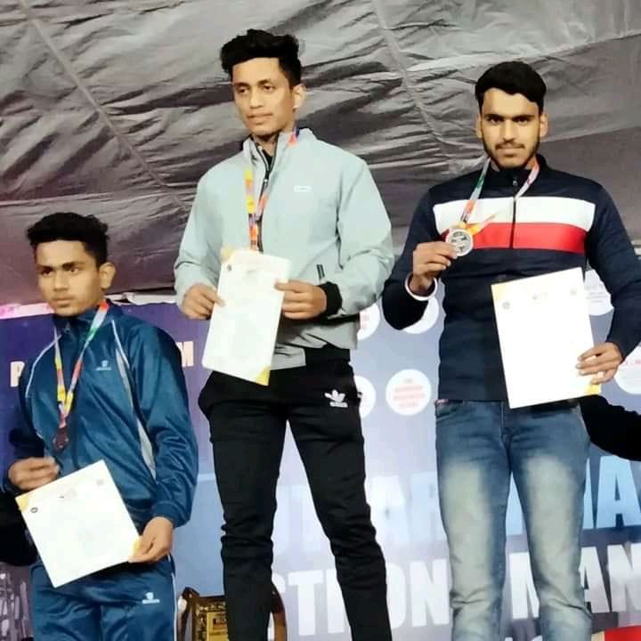 Karan Wins Silver