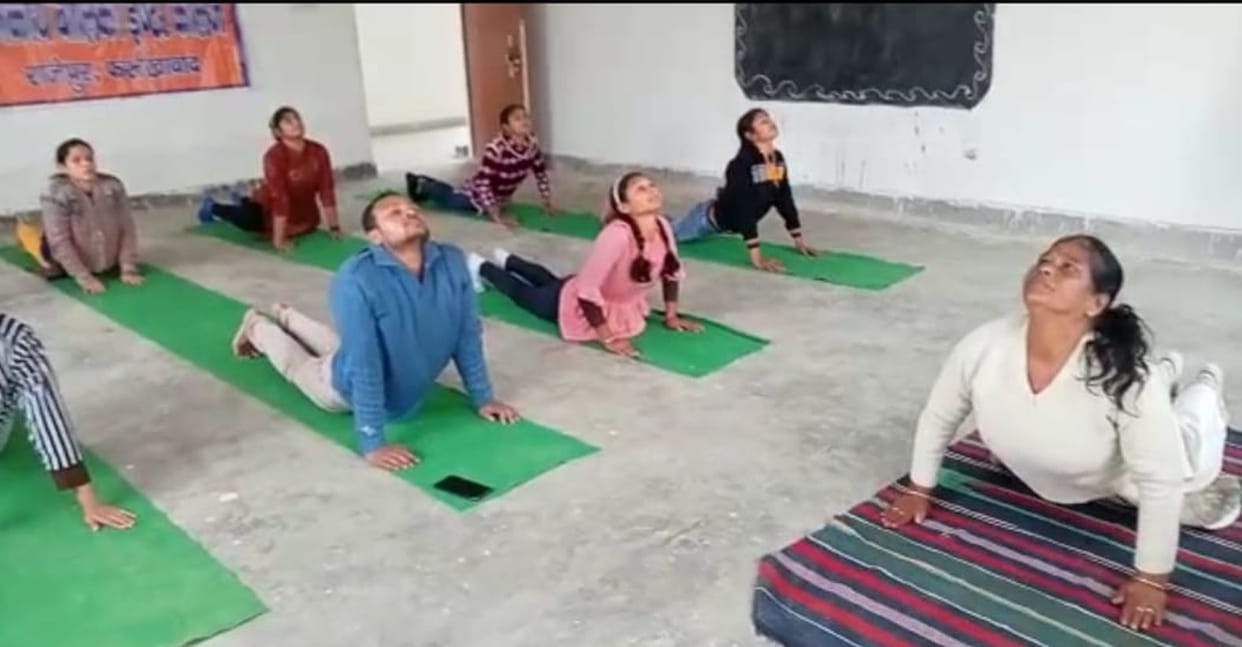 Surya Namaskar by students, teachers and employees