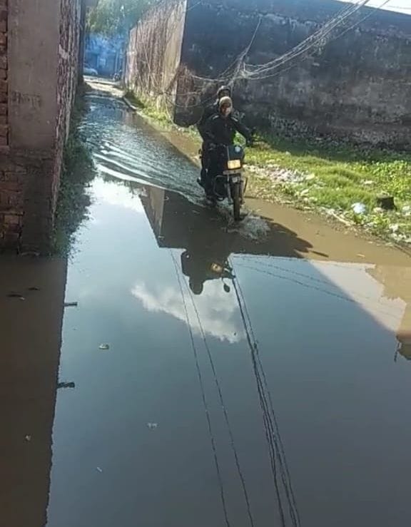 Waterlogging in new settlement, difficult to walk on roads