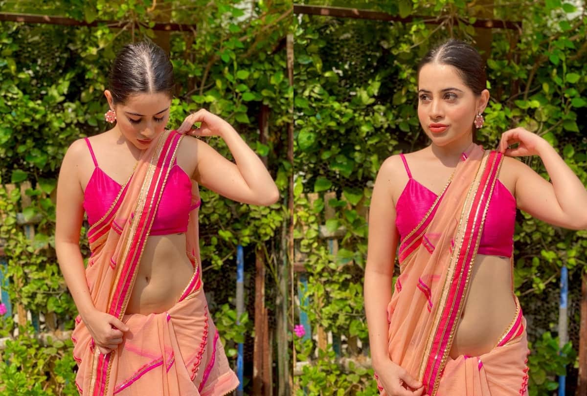 Urfi Javed drapped in net blue saree with off shoulder blouse in winters