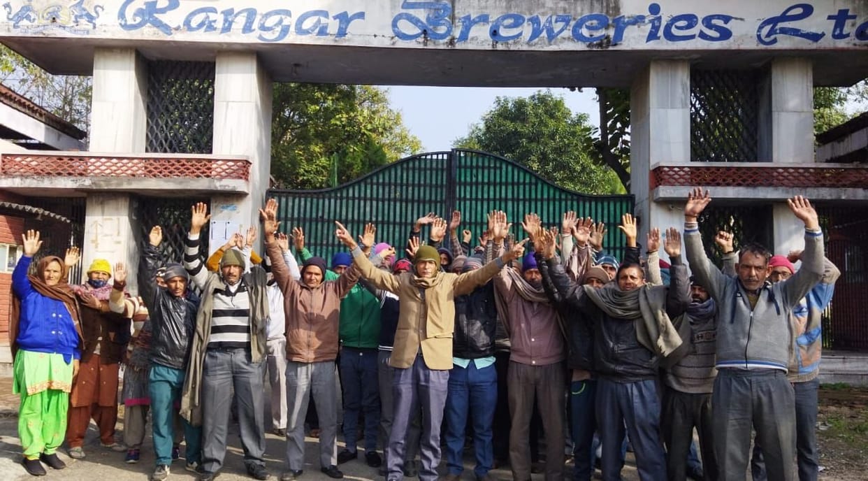 in mehatpur workers of wine factory for their demands  strike  against factory  administration
